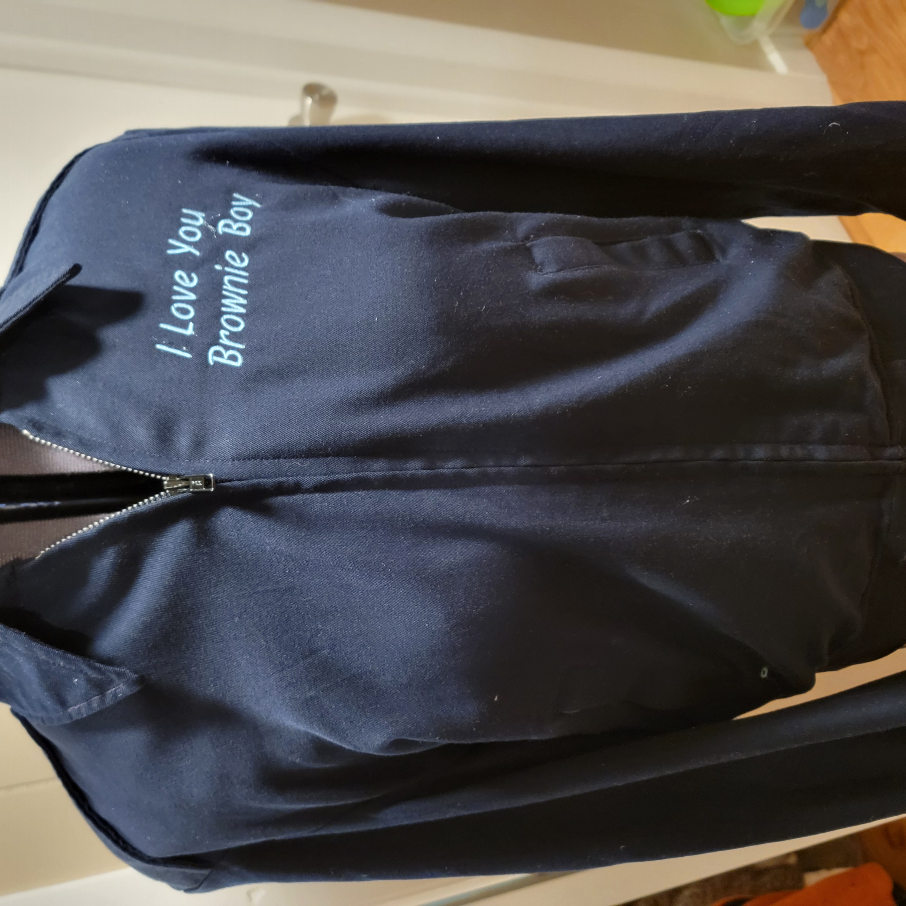 Completed navy jacket with personalized Brownie Boy embroidery