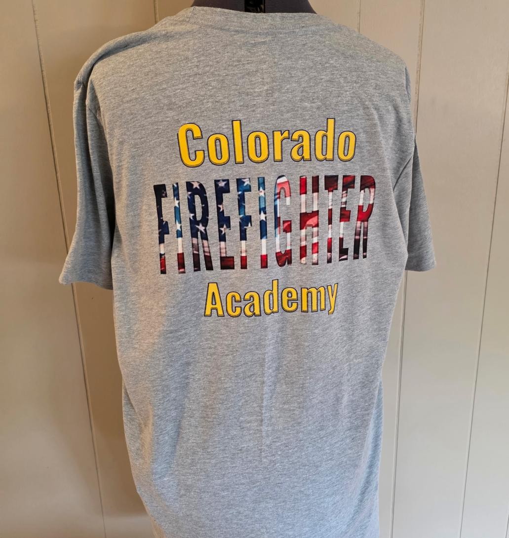 Completed Colorado Firefighter Academy shirt with an American flag firefighter back design