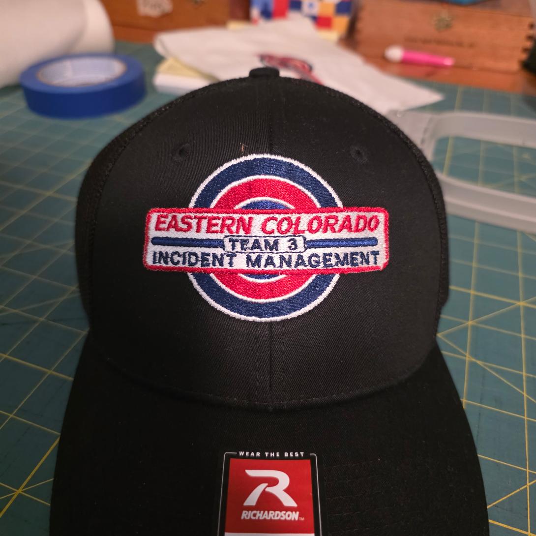 Completed black cap embroidered for Eastern Colorado Incident Management Team 3