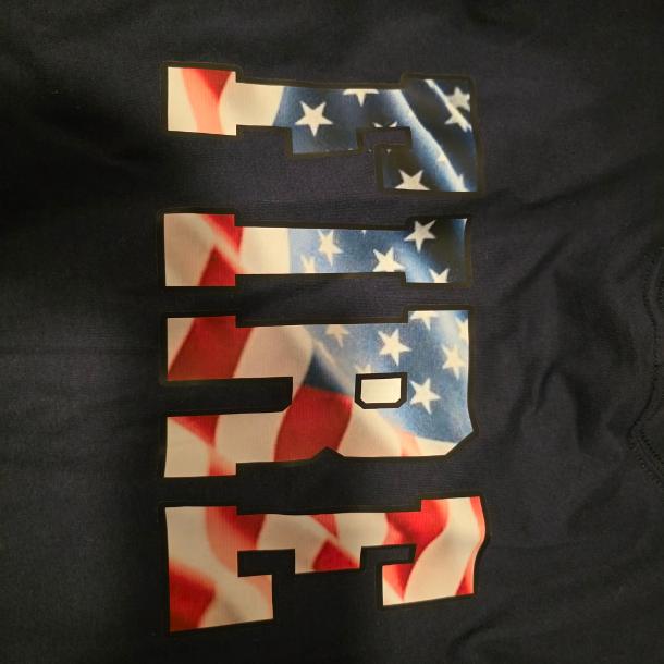 Completed black FIRE shirt with large American flag-inspired back design