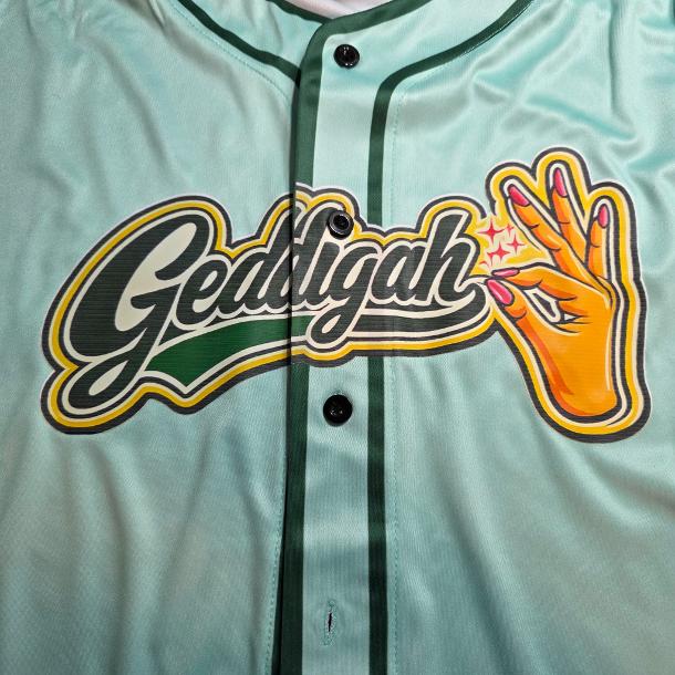 Completed teal baseball-style jersey with a detailed Geddigah graphic across the front