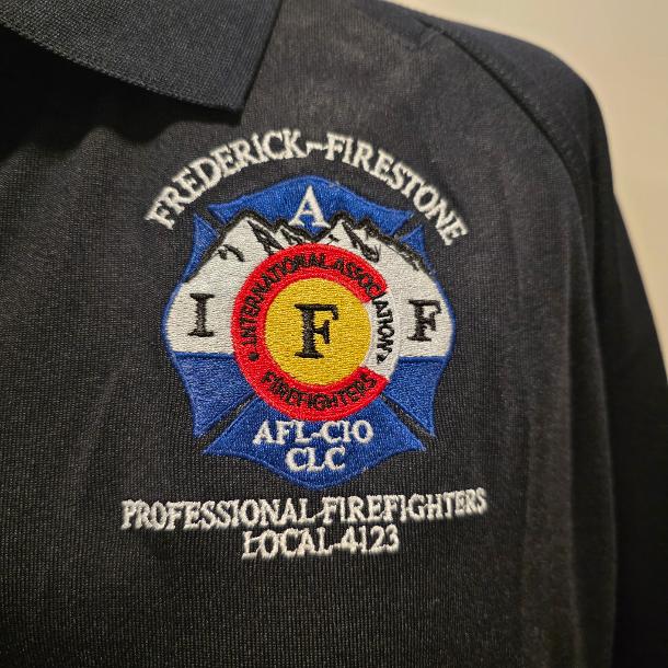 Close-up of Local 4123 embroidery on finished apparel