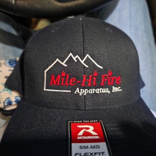 Completed black Richardson hat embroidered with the Mile-Hi Fire Apparatus logo