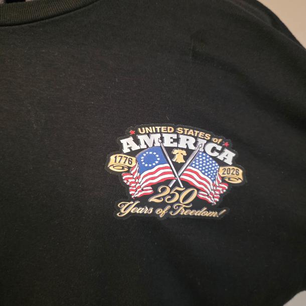 Completed black USA 250 shirt with a small full-color America 250 front chest design