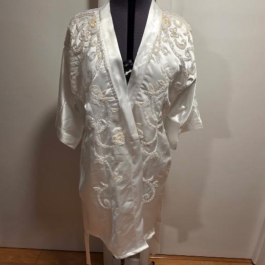 Completed white custom keepsake robe created from the mother's wedding dress