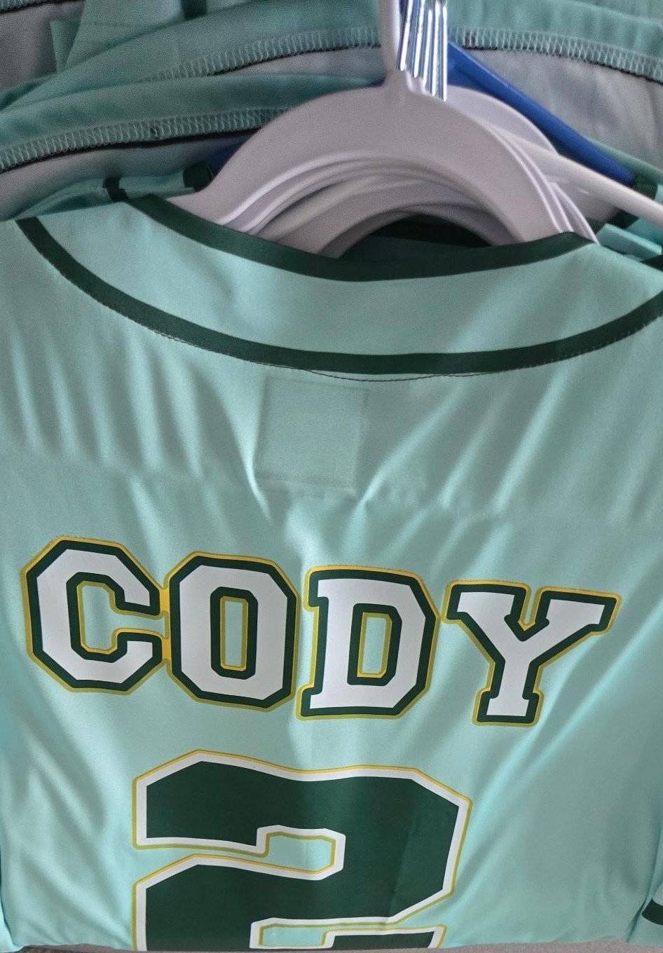 Completed mint Geddigah jersey back with CODY name and number 2