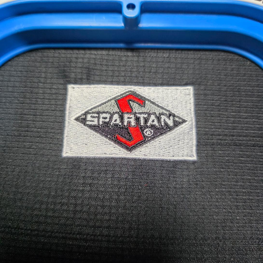 Detailed Spartan logo embroidery stitched in red, black, gray, and white thread